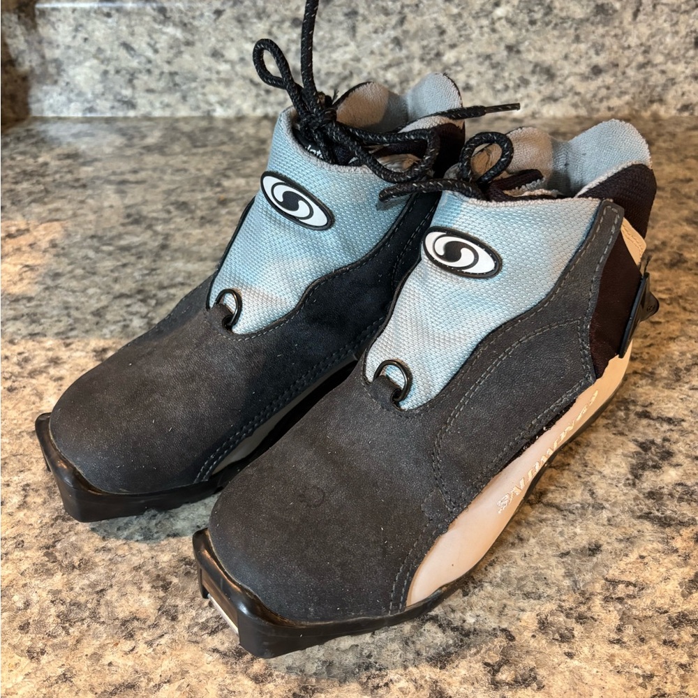 Salomon Kids Black and Gray cross country boots.